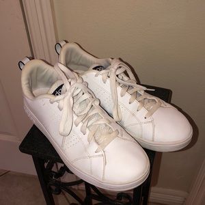 Used white Adidas sneakers
